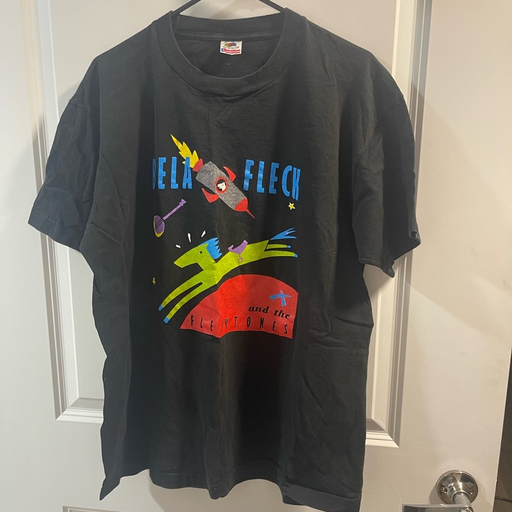 Vintage Black Novelty Graphic T-Shirt with Colorful Rocket and Horse Design